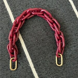 NWOT Clare V shortie resin strap in Ox Blood. The perfect accessory for any bag.